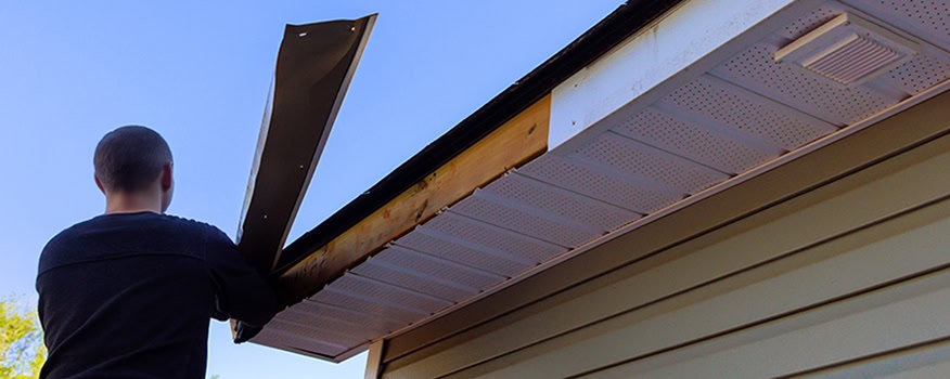 Ace Roofing & Construction performing emergency roof repair on a home in Indianapolis